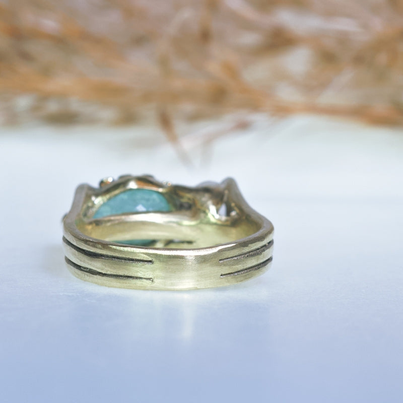 Gold ring with Paraíba tourmaline and danburite