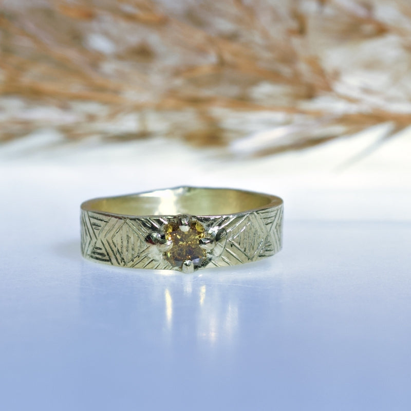 Gold ring with yellow diamond
