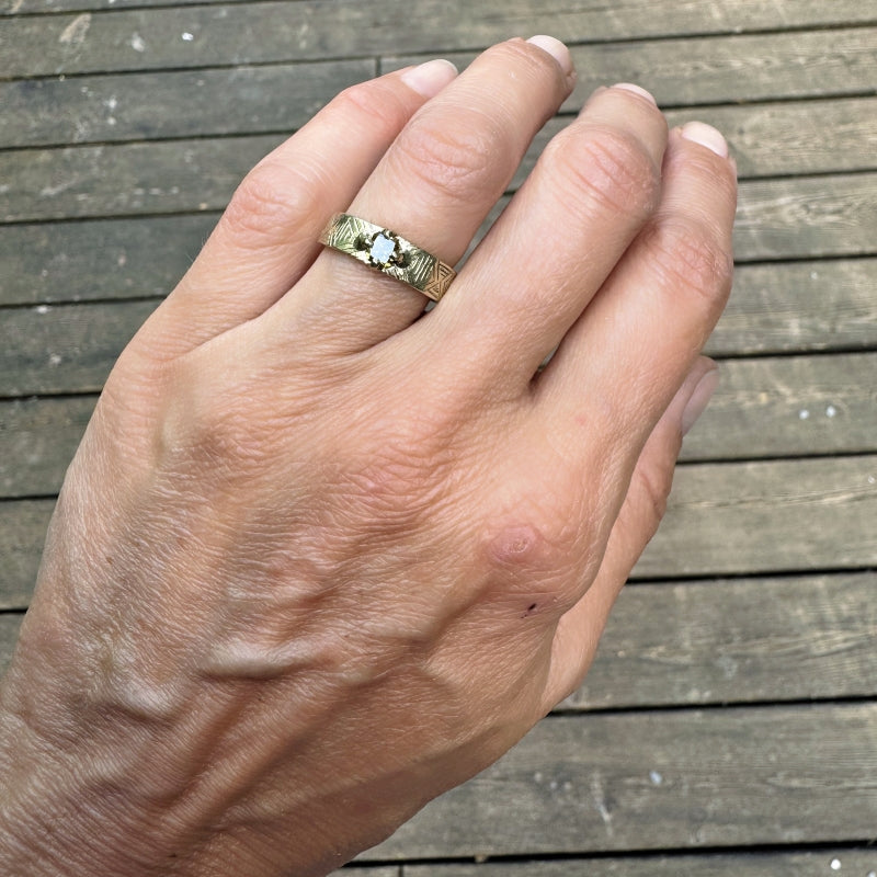 Gold ring with yellow diamond