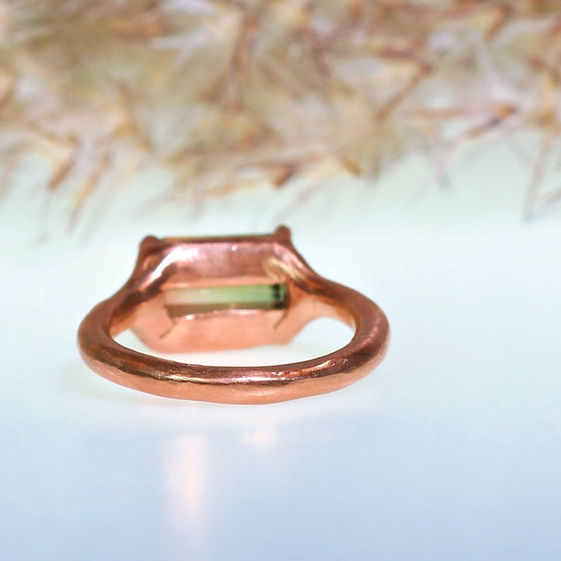 Rose gold ring with small bicolor tourmaline